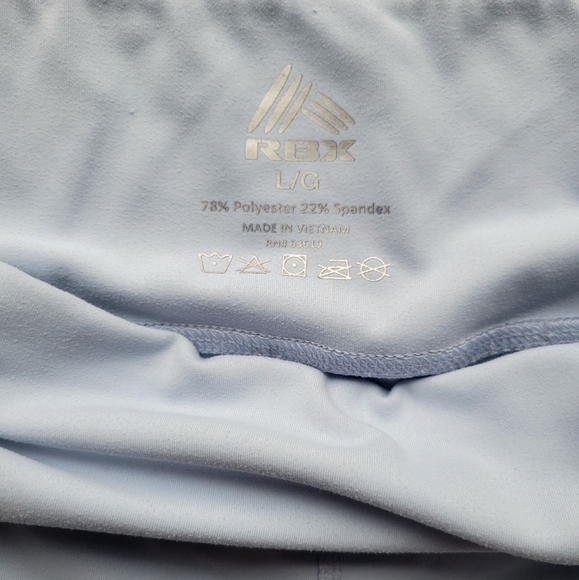 Size large, light blue RBX gym shorts with two side pockets - Picture 3 of 3